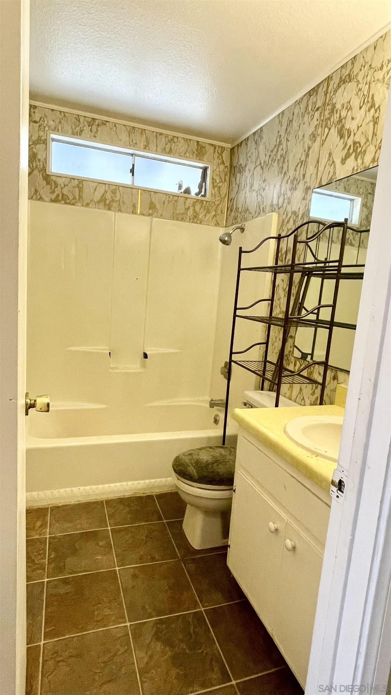 764 Surrey Trail Julian, CA 92036 - Photo 9 of 15 a bathroom with a toilet and a shower