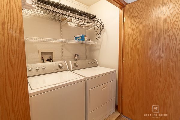 146 Enclave Circle, Unit D Bolingbrook, IL 60440 - Photo 24 of 33 a utility room with dryer and washer