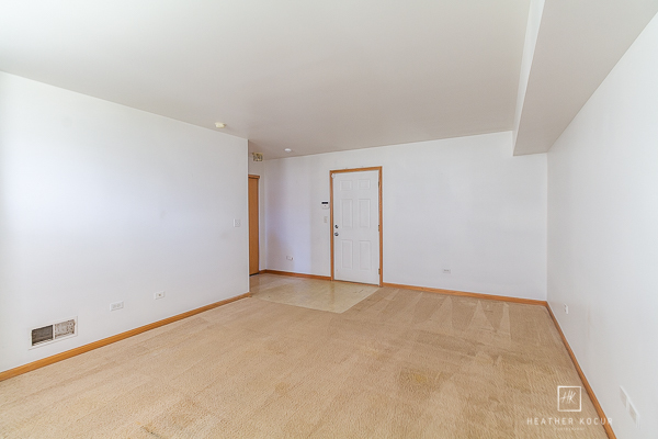 146 Enclave Circle, Unit D Bolingbrook, IL 60440 - Photo 27 of 33 an empty room with an entryway