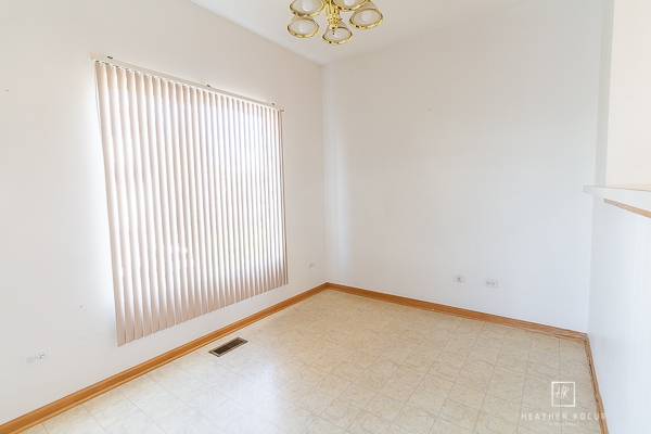 146 Enclave Circle, Unit D Bolingbrook, IL 60440 - Photo 8 of 33 an empty room with a window