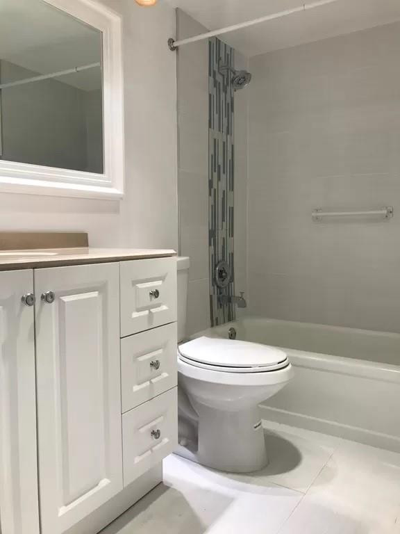 21 Dorset A Boca Raton, FL 33434 - Photo 7 of 7 a bathroom with a toilet sink and shower