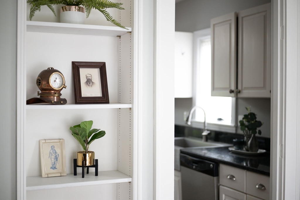 8 Baker Avenue Beverly, MA 01915 - Photo 11 of 40 a kitchen with a sink and cabinets