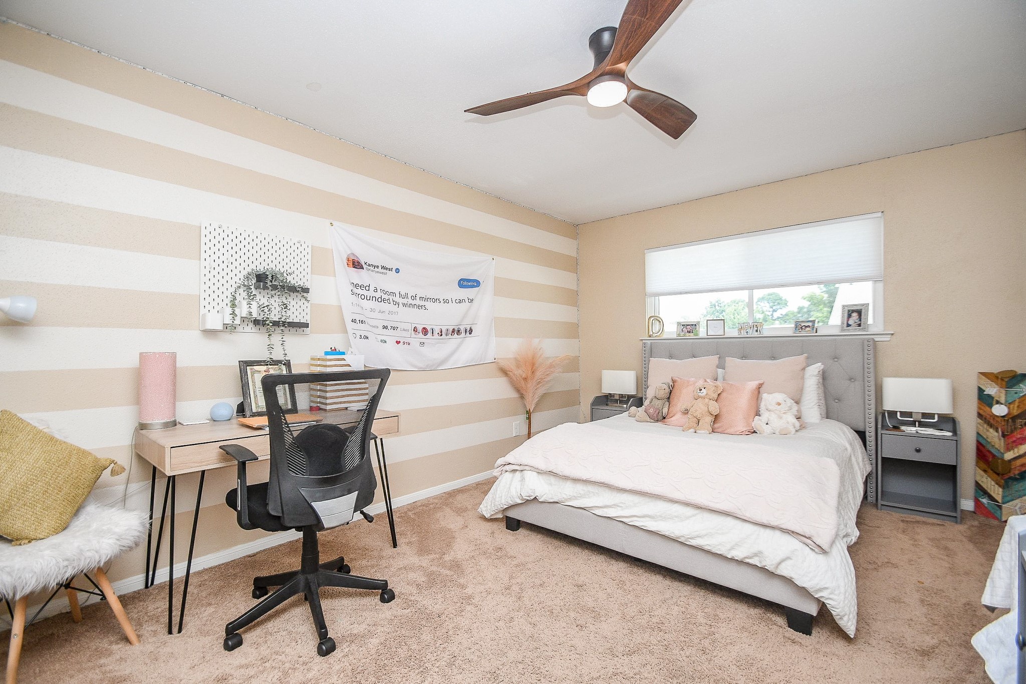 14686 Perthshire Road, Unit H Houston, TX 77079 - Photo 17 of 22 a bedroom with a bed a chair and a large dresser