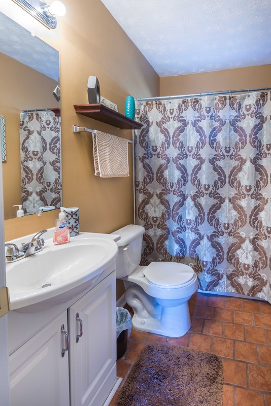 3239 West Britt David Road Columbus, GA 31909 - Photo 14 of 16 Fully Updated Hall Bath