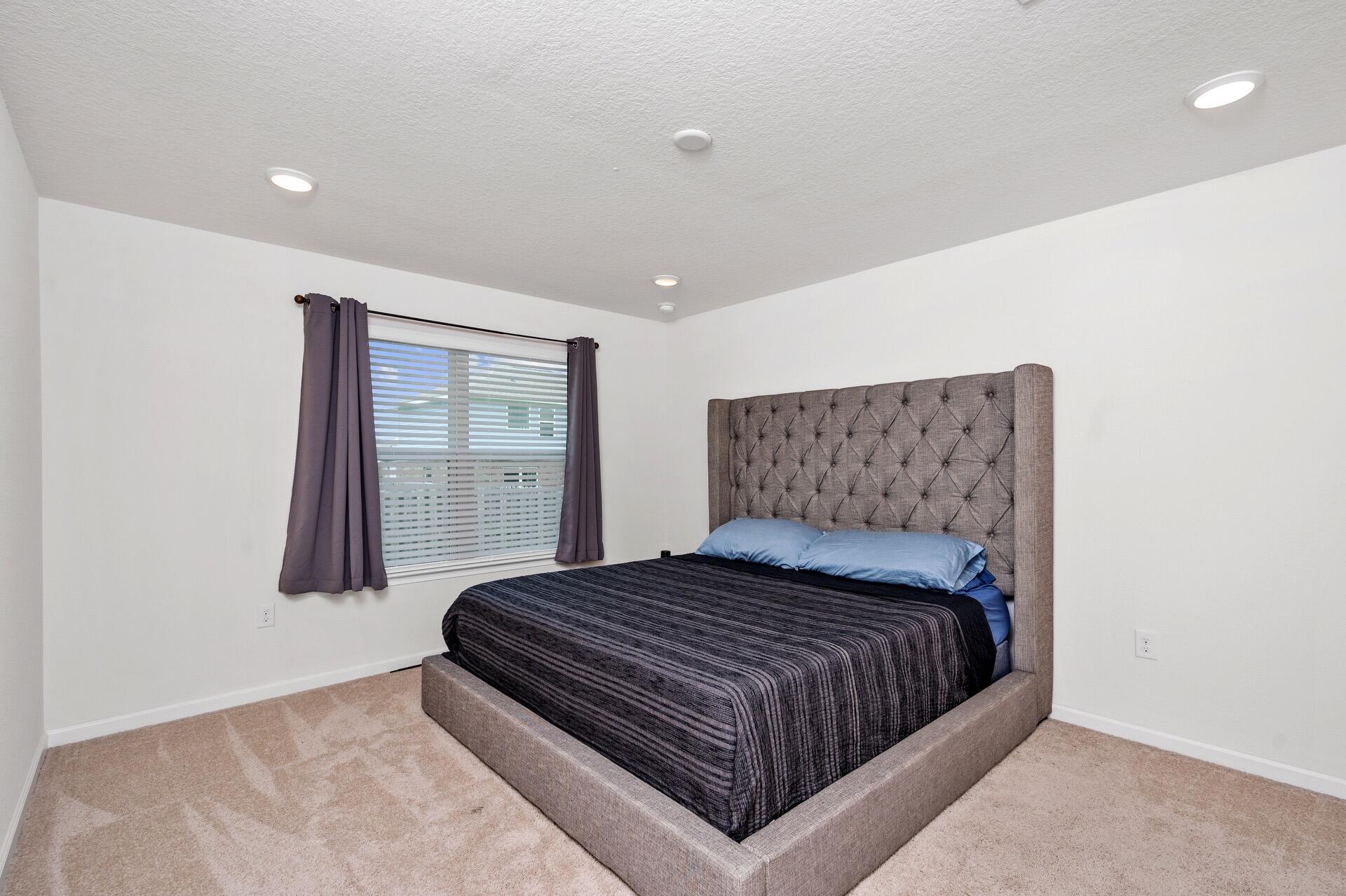 816 Moorhen Way Crestview, FL 32539 - Photo 15 of 22 a bedroom with a bed and window