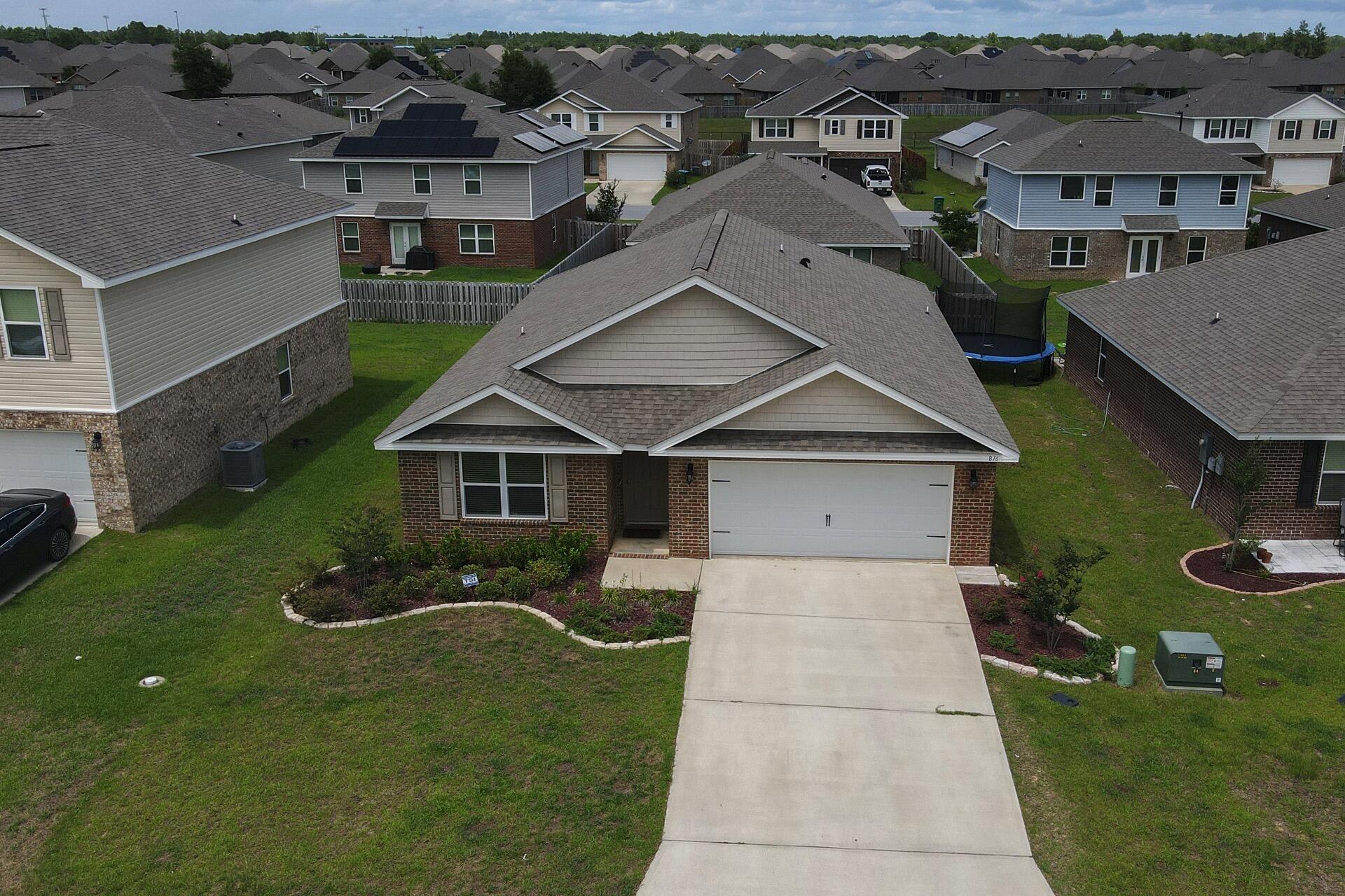 816 Moorhen Way Crestview, FL 32539 - Photo 5 of 22 an aerial view of a house with garden