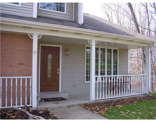 122 Harbison Road Valencia, PA 16059 - Photo 3 of 18 Exterior Front. Taking it easy on the Front Porch - quiet street, quiet neighborhood