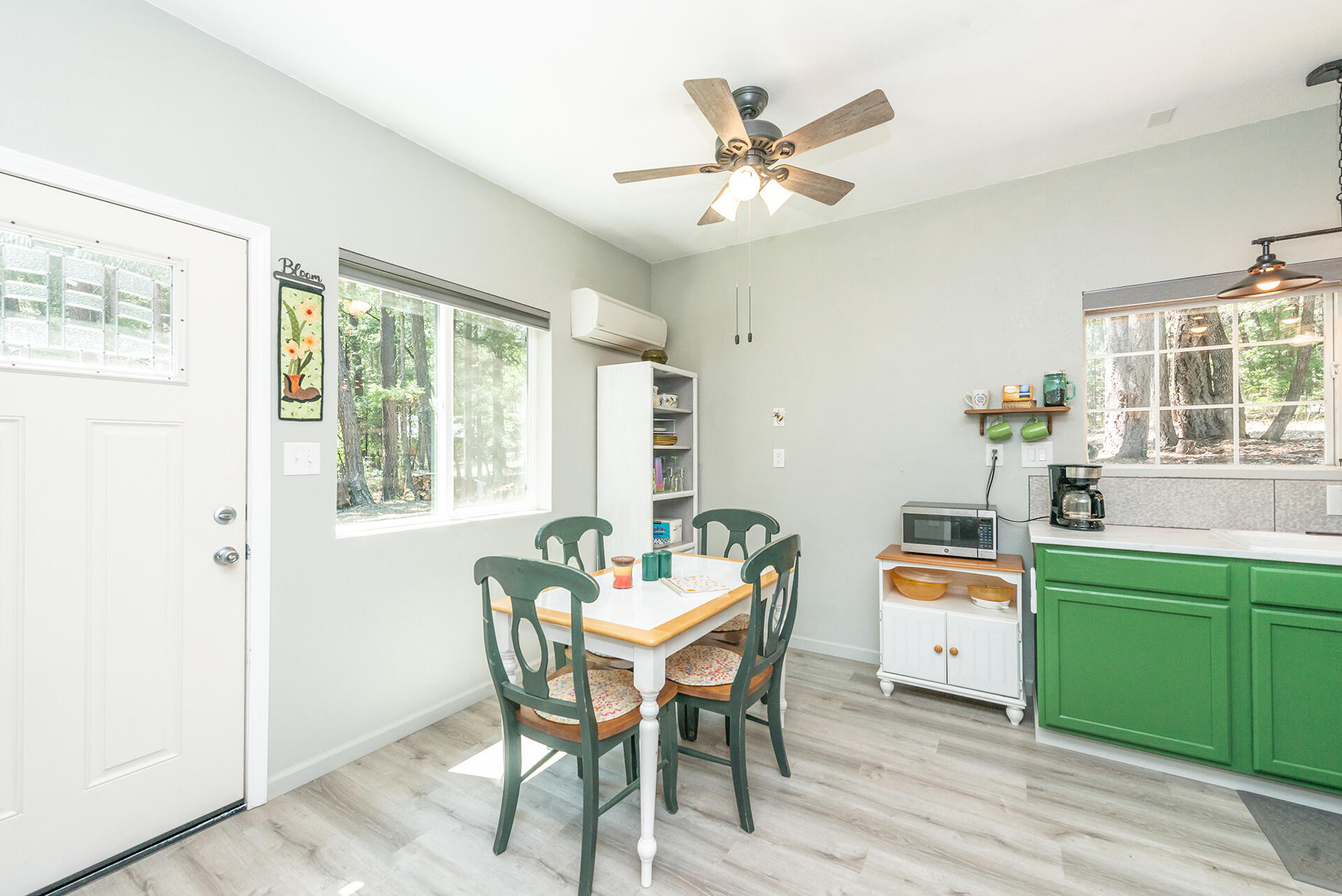 1371 Eagle Creek Loop Trinity Center, CA 96091 - Photo 11 of 37 a dining room with a wooden table and chairs