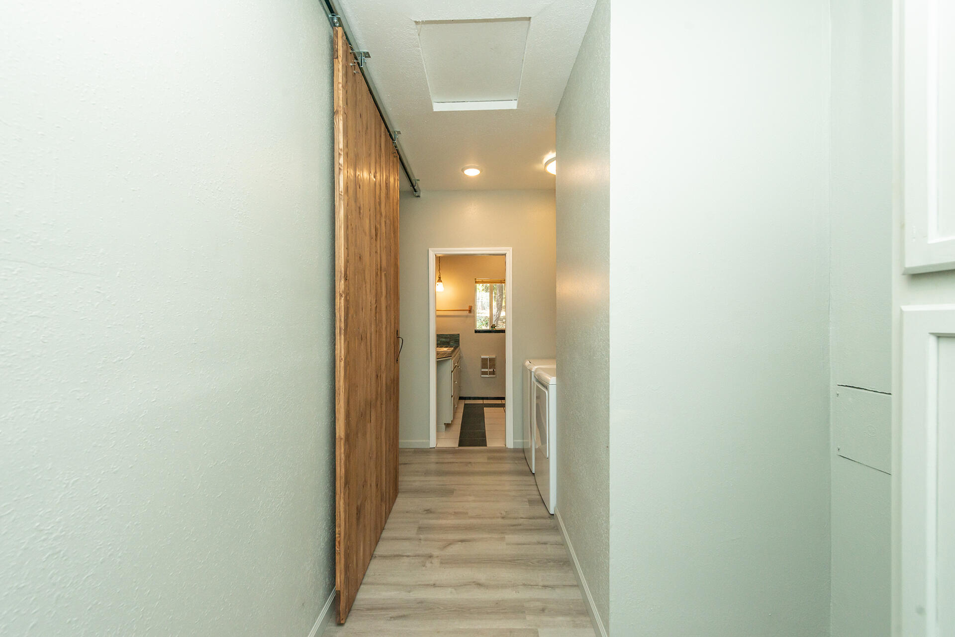 1371 Eagle Creek Loop Trinity Center, CA 96091 - Photo 14 of 37 a view of a hallway with wooden floor and staircase