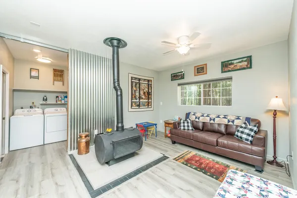 a living room with furniture and a window