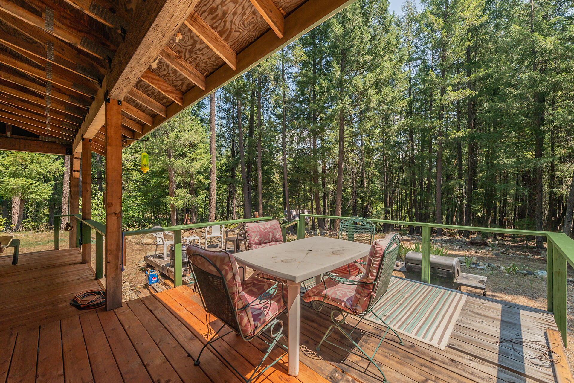 1371 Eagle Creek Loop Trinity Center, CA 96091 - Photo 25 of 37 a view of a chairs and table on the wooden floor