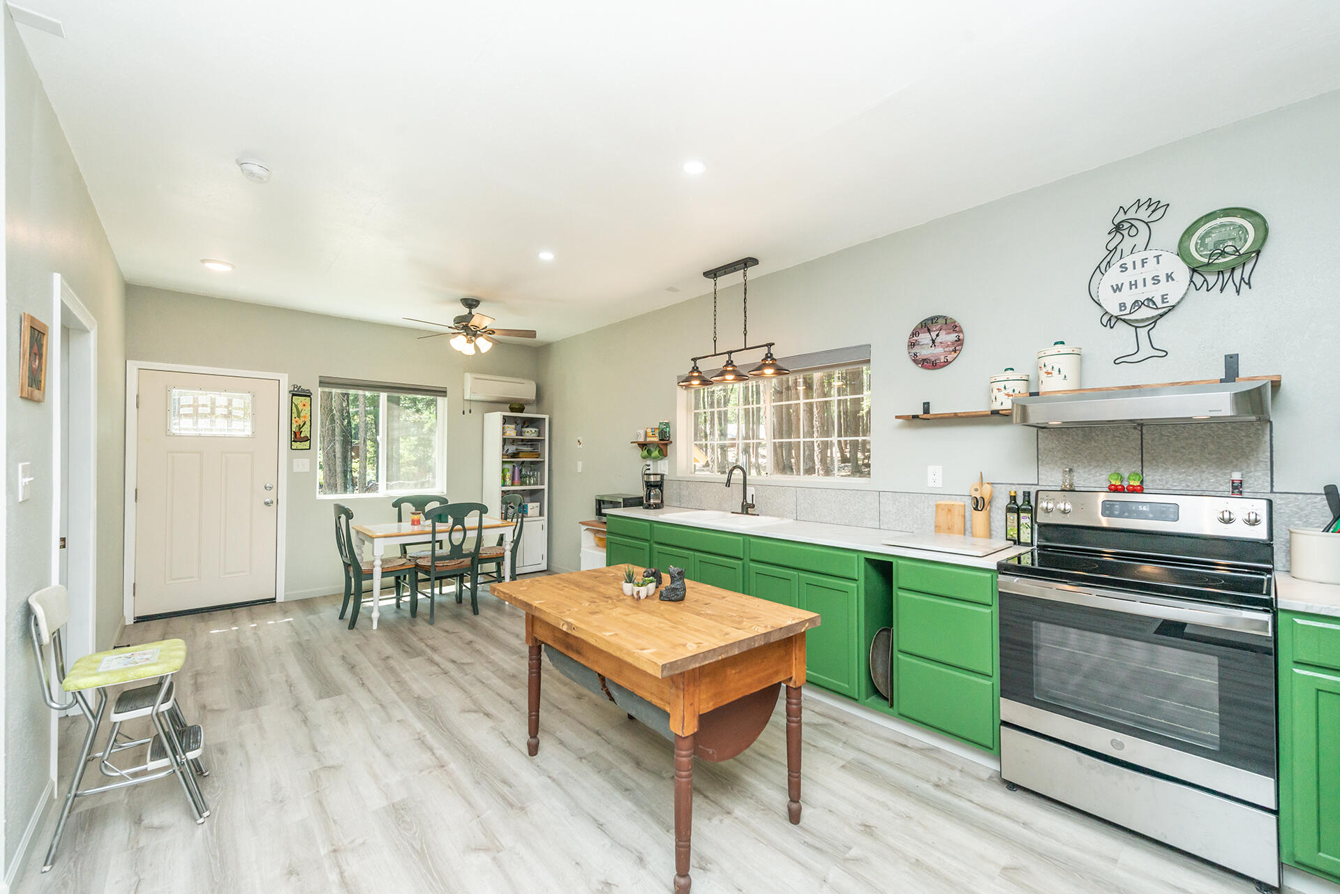 1371 Eagle Creek Loop Trinity Center, CA 96091 - Photo 8 of 37 a kitchen with a table and chairs in it