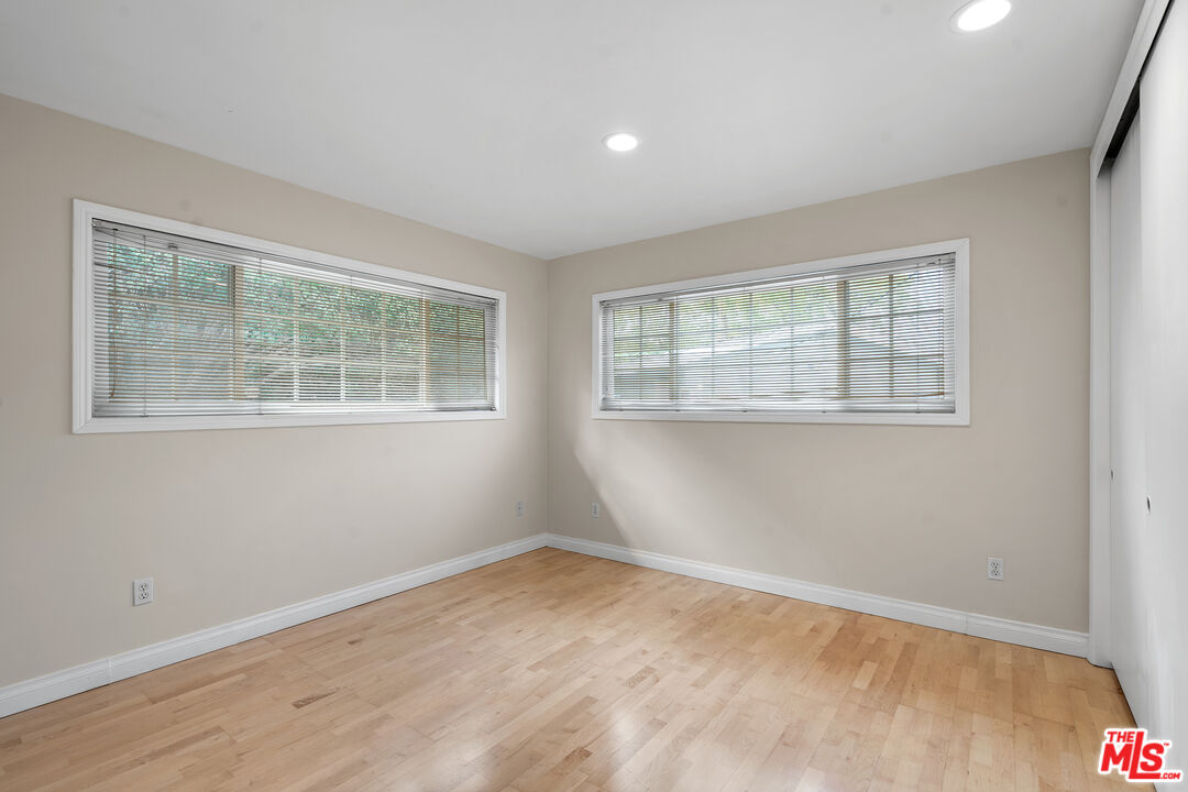9631 Crystal View Drive Tujunga, CA 91042 - Photo 27 of 37 a view of empty room with windows