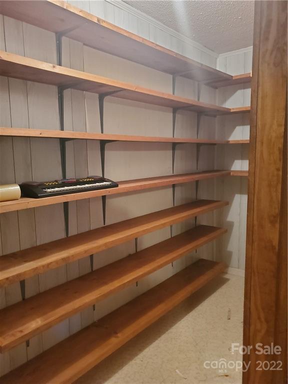 4401 Poplar Tent Road Concord, NC 28027 - Photo 7 of 16 a view of a room with shelf
