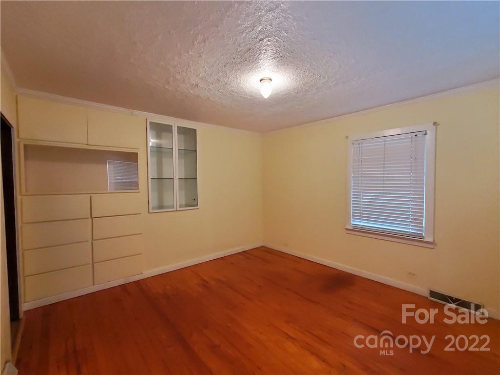 4401 Poplar Tent Road Concord, NC 28027 - Photo 8 of 16 a view of empty room with windows