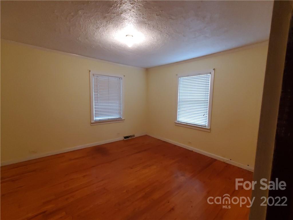 4401 Poplar Tent Road Concord, NC 28027 - Photo 9 of 16 an empty room with a window
