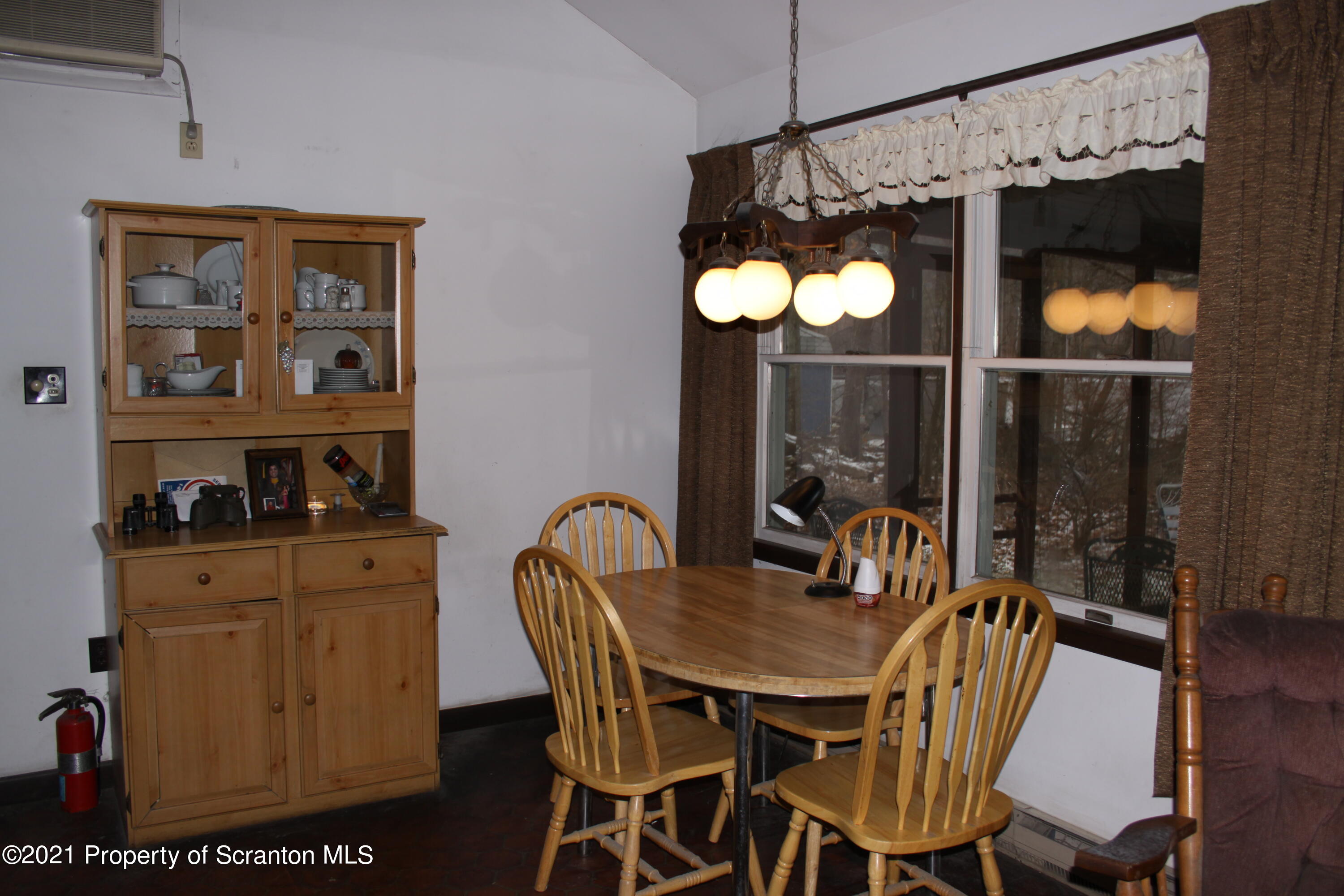 46 Cove Road Tunkhannock, PA 18657 - Photo 11 of 20 a dining room with furniture and window