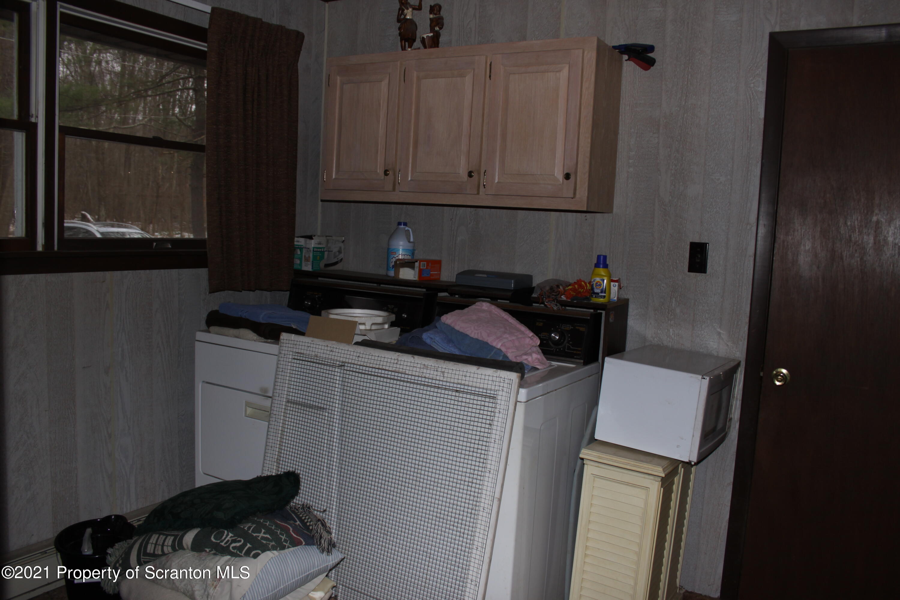 46 Cove Road Tunkhannock, PA 18657 - Photo 16 of 20 a kitchen with a sink and cabinets