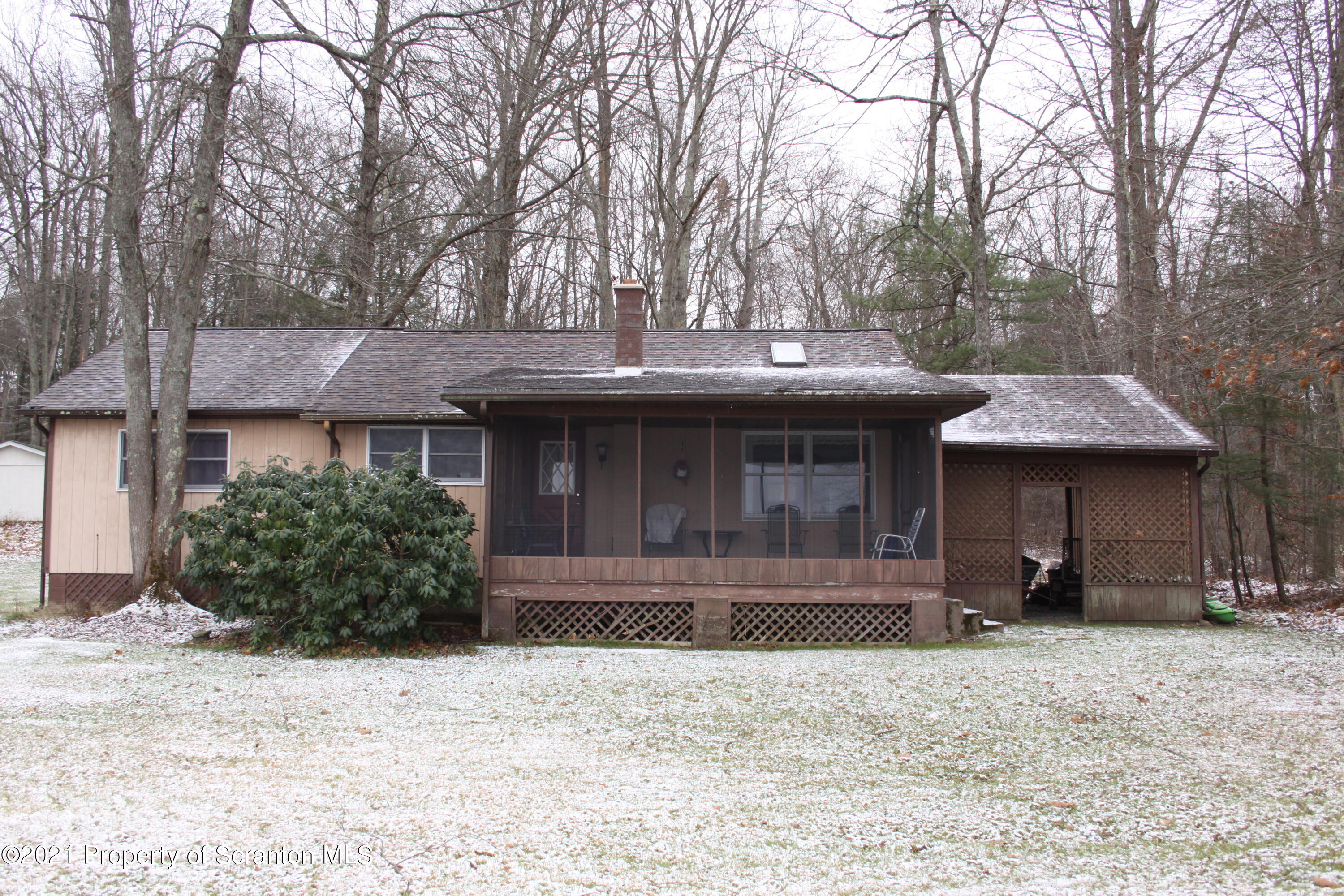 46 Cove Road Tunkhannock, PA 18657 - Photo 4 of 20 a front view of a house with garden