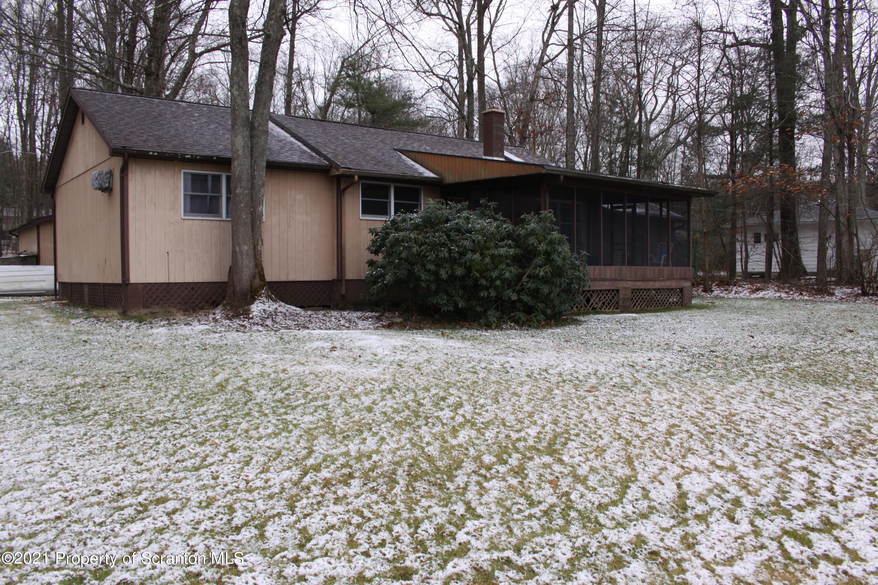 46 Cove Road Tunkhannock, PA 18657 - Photo 7 of 20 a view of a house with a yard