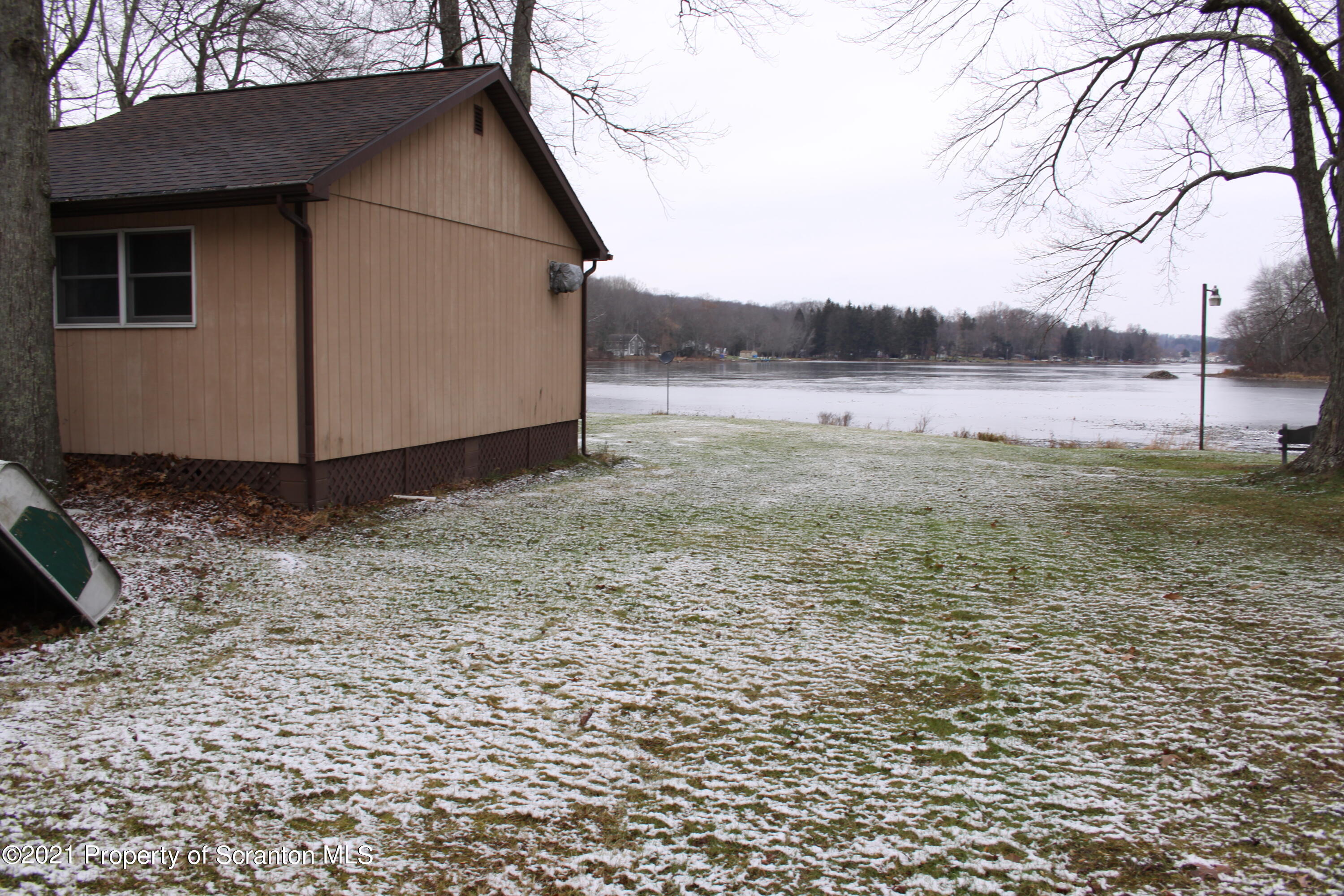 46 Cove Road Tunkhannock, PA 18657 - Photo 8 of 20 a view of a backyard of a house