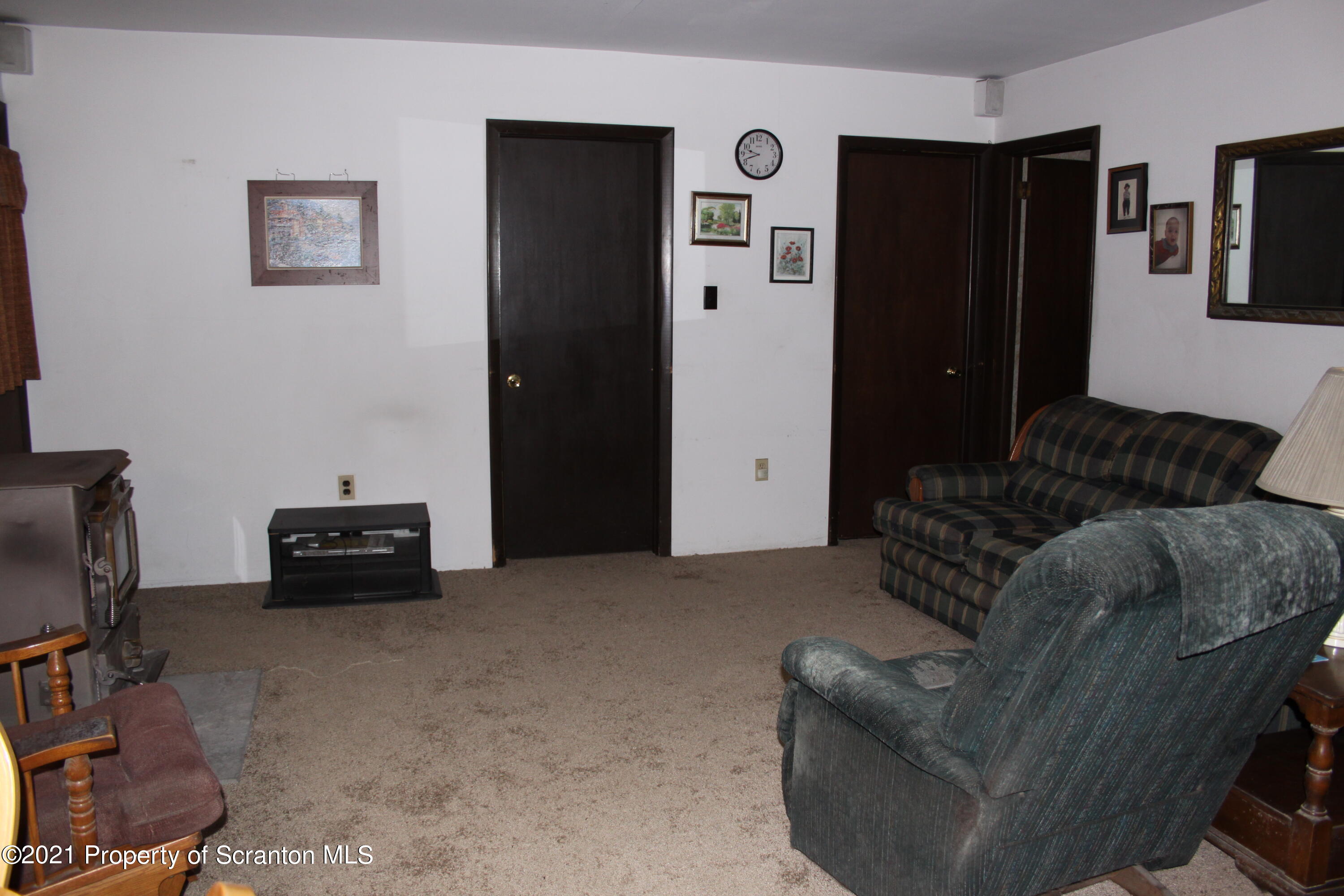 46 Cove Road Tunkhannock, PA 18657 - Photo 10 of 20 a living room with furniture and a flat screen tv