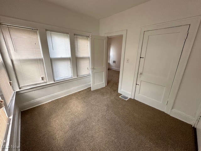1612 Hillcrest Road Cleveland, OH 44118 - Photo 16 of 29 Unfurnished bedroom with dark colored carpet