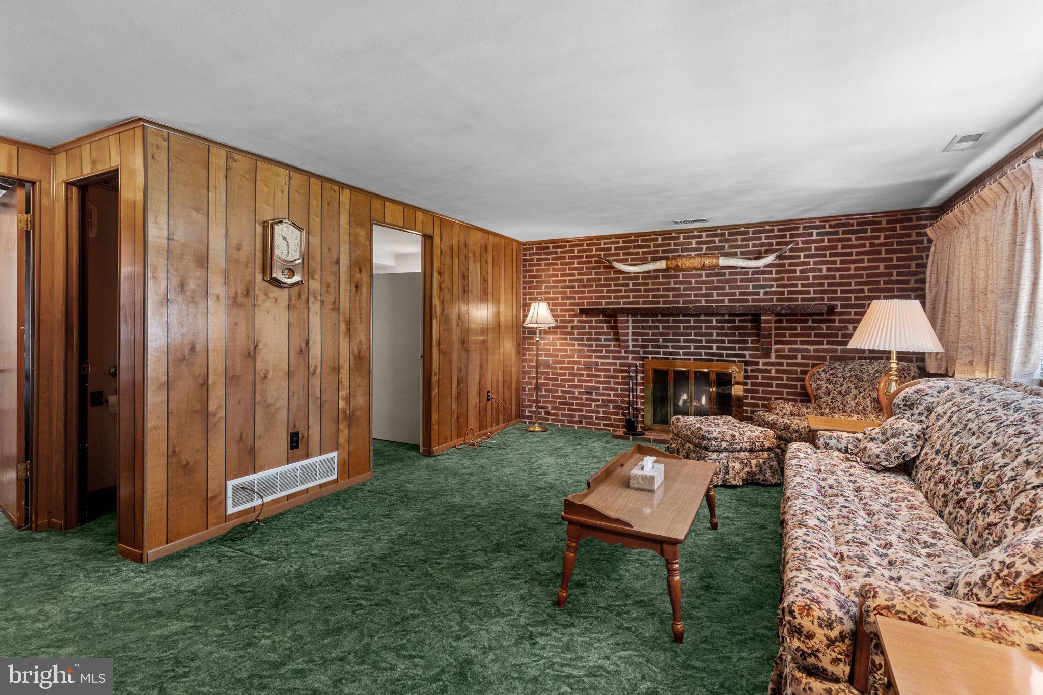 857 West County Line Road Warminster, PA 18974 - Photo 15 of 38 a living room with furniture and a fireplace