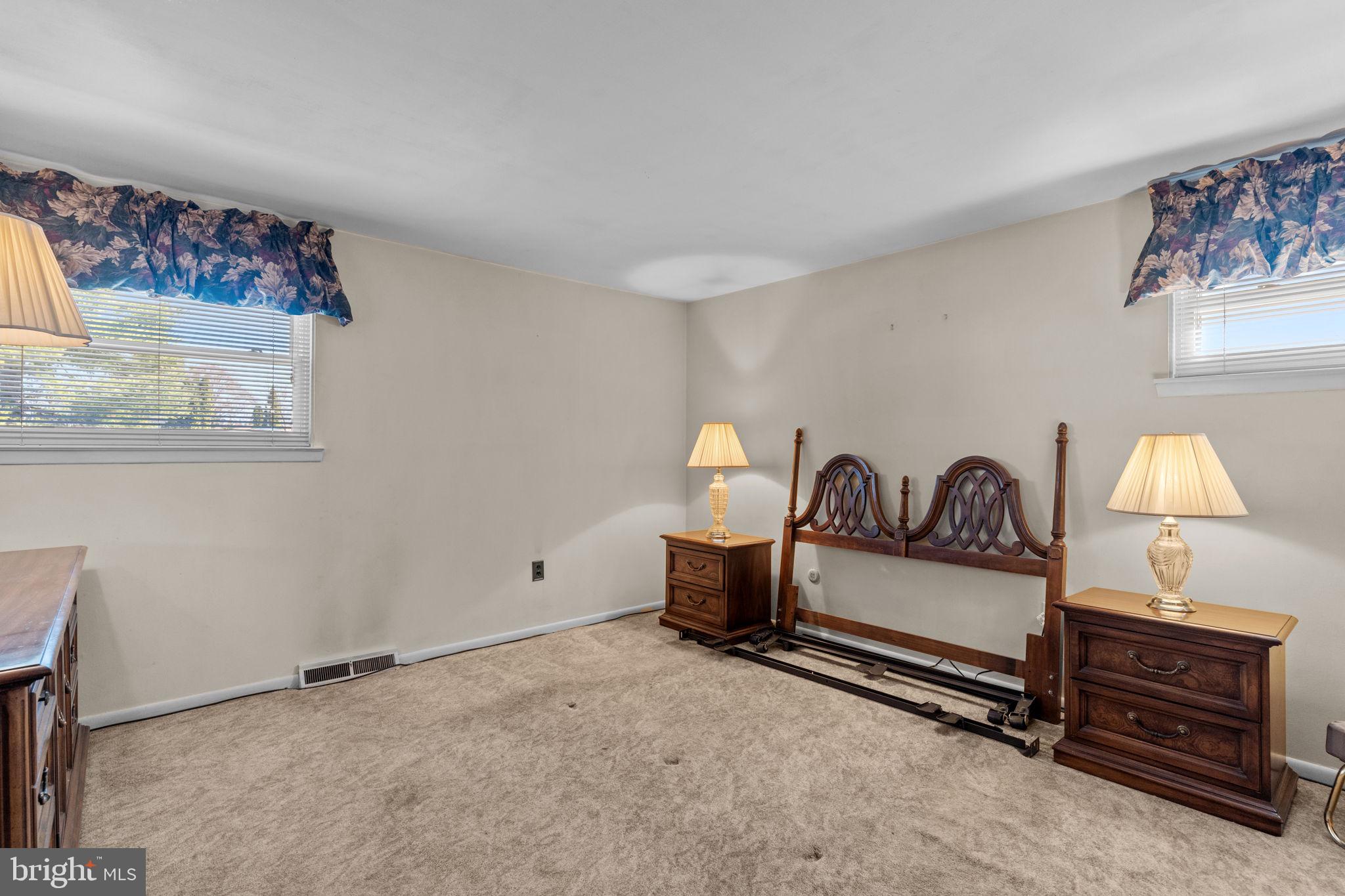 857 West County Line Road Warminster, PA 18974 - Photo 20 of 38 a bedroom with furniture and a window