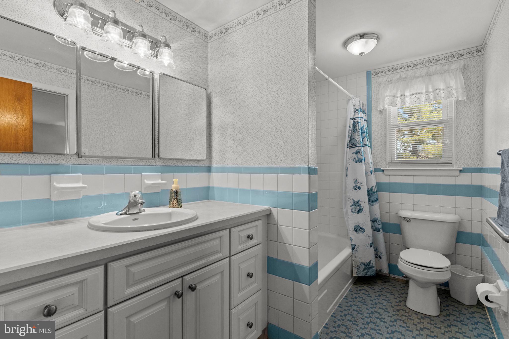 857 West County Line Road Warminster, PA 18974 - Photo 22 of 38 a bathroom with a sink a toilet and shower