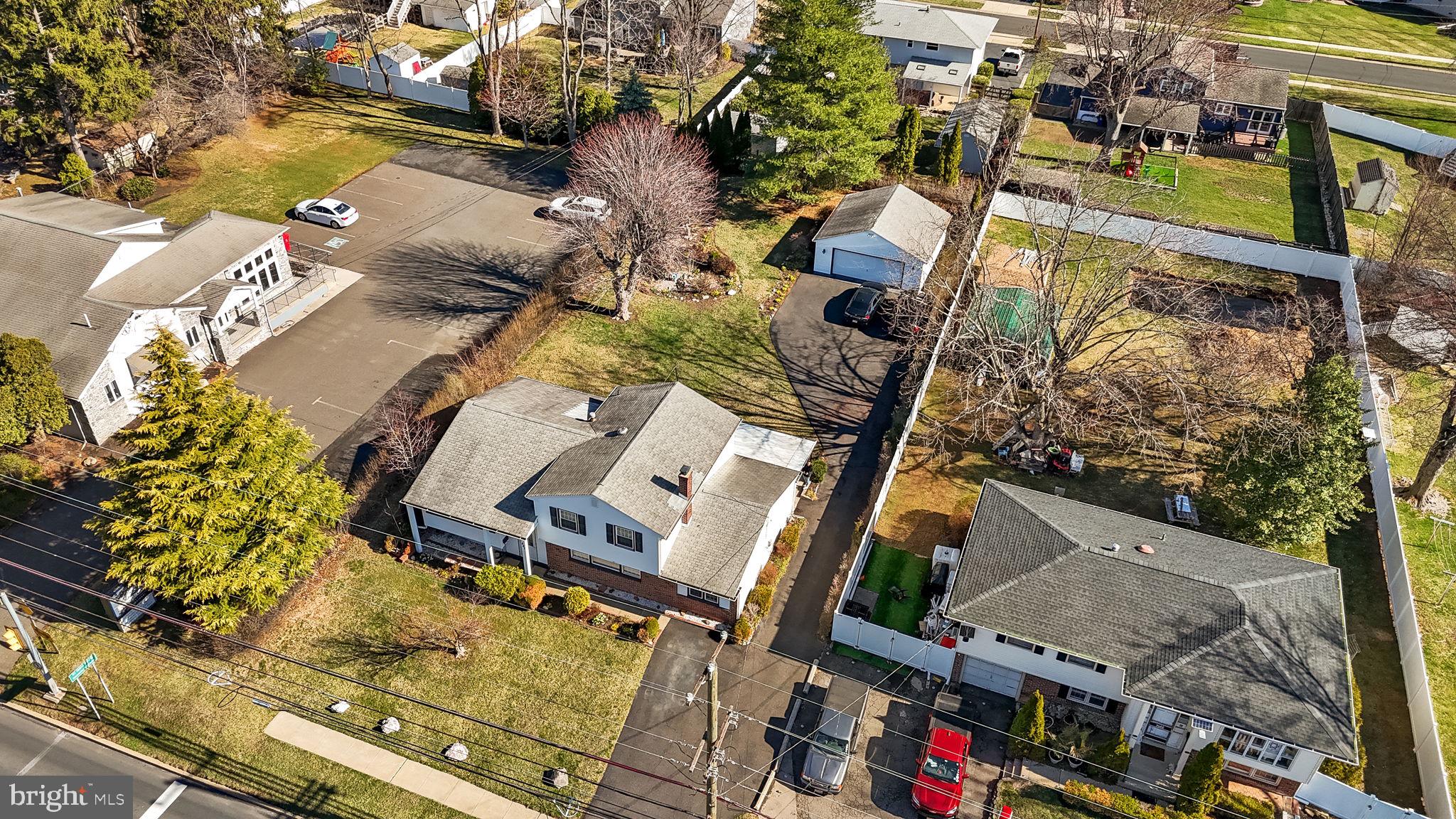 857 West County Line Road Warminster, PA 18974 - Photo 36 of 38 an aerial view of residential houses with outdoor space