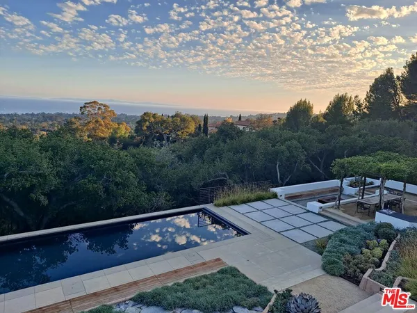 a view of a terrace with a yard