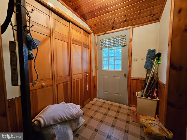 a bed room with a bed and furniture