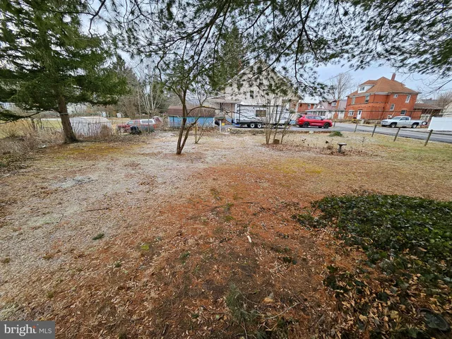 a view of road with trees