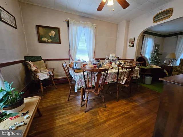 a kitchen with stainless steel appliances granite countertop sink stove and refrigerator