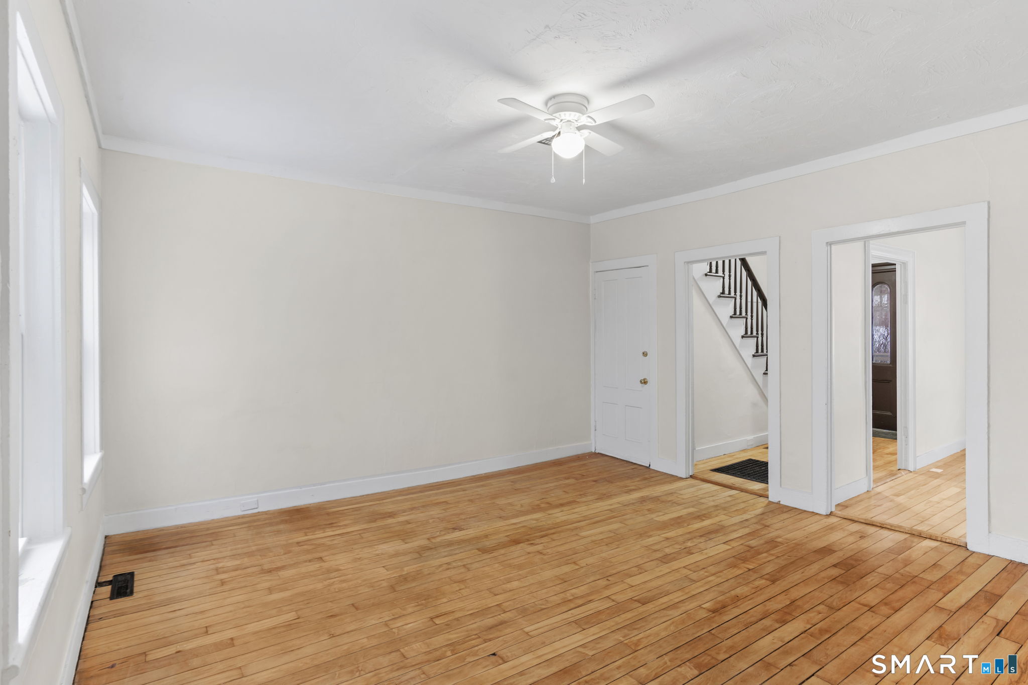 365-367 Putnam Road Plainfield, CT 06387 - Photo 15 of 40 a view of an empty room with wooden floor