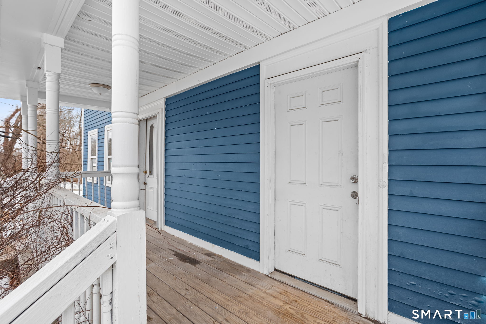 365-367 Putnam Road Plainfield, CT 06387 - Photo 20 of 40 a view of balcony door and wooden floor