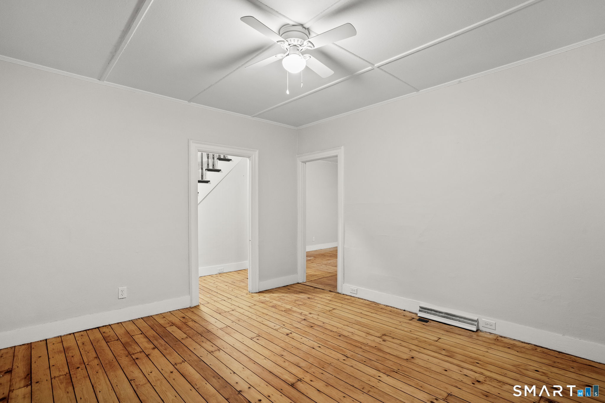 365-367 Putnam Road Plainfield, CT 06387 - Photo 30 of 40 a view of an empty room with wooden floor