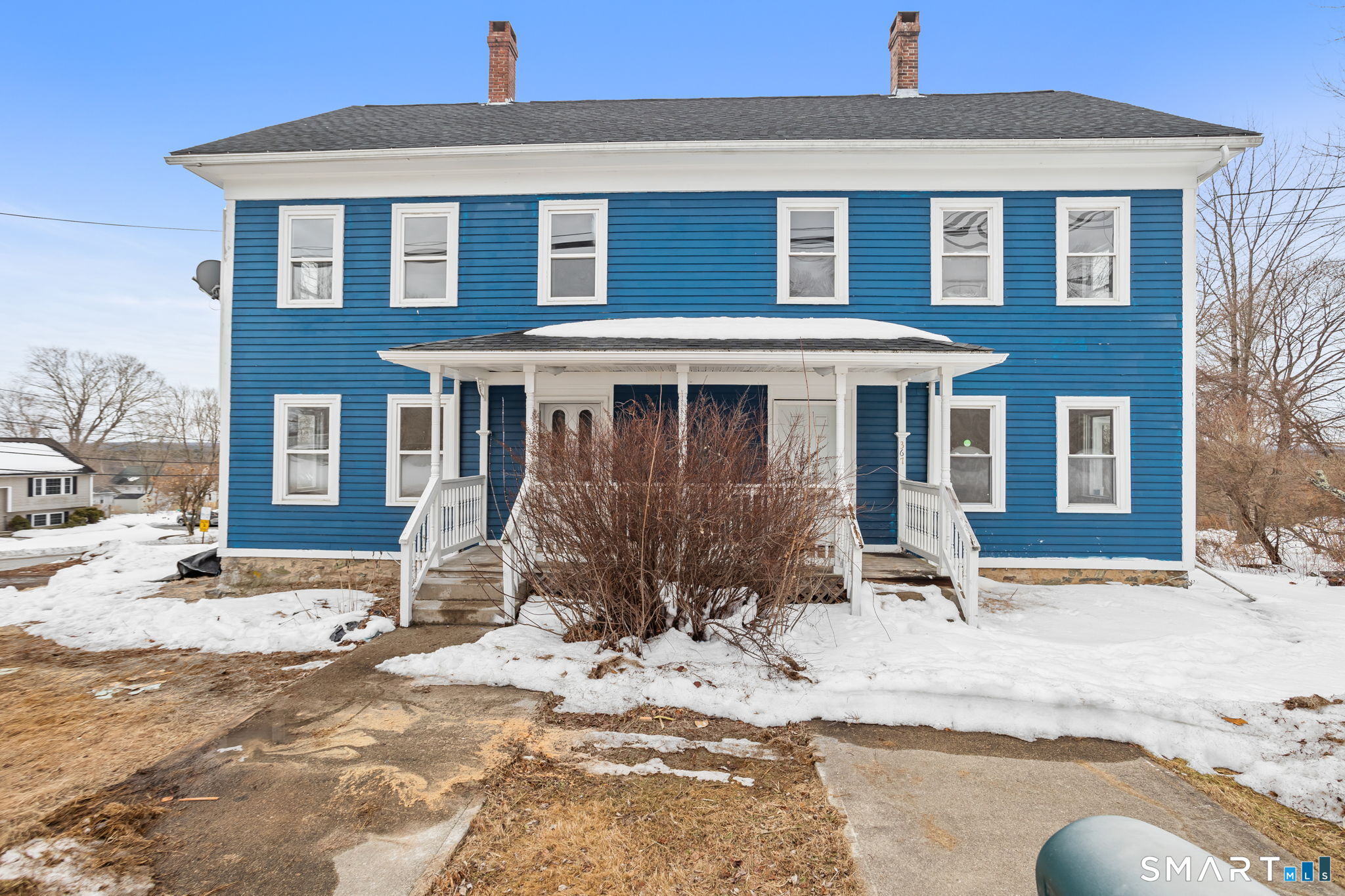 365-367 Putnam Road Plainfield, CT 06387 - Photo 5 of 40 a front view of a house with a yard