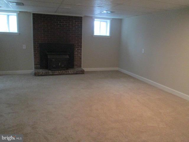 8741 Pohick Road Springfield, VA 22153 - Photo 22 of 30 Family Room with fireplace and insert