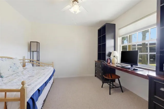 a view of a workspace with furniture