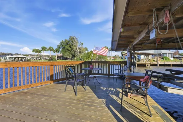 a view of a balcony with chairs