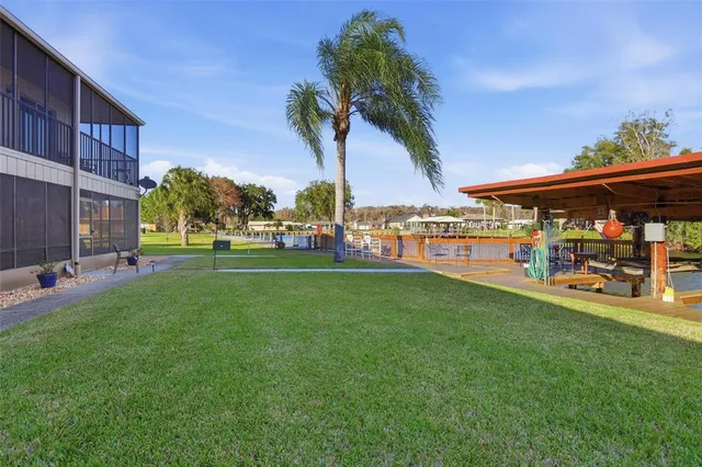 a view of a car park in front of house