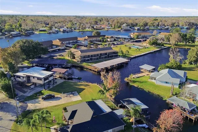 an aerial view of a houses with outdoor space