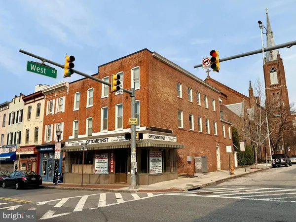 a front view of a building and a street