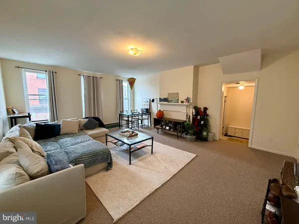 a utility room with sink dryer and washer