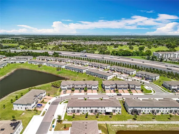 a view of lake with yard