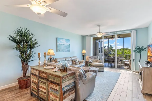 a kitchen with a sink stainless steel appliances and cabinets