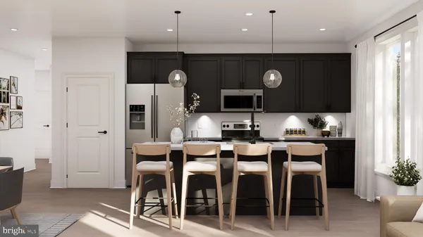 a large kitchen with a table and chairs