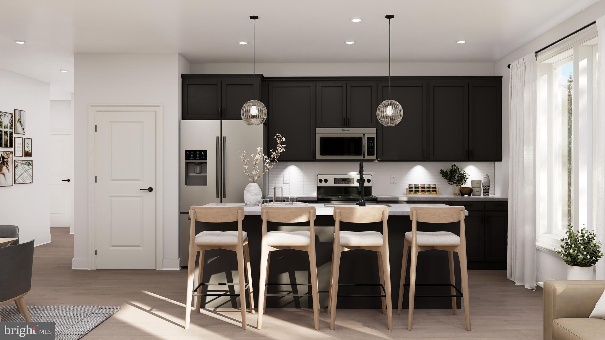 83 Bethlehem Pike, Unit 1102 Colmar, PA 18915 - Photo 2 of 16 a large kitchen with a table and chairs